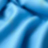 Close-up of a stylish ice blue suit fabric showcasing its texture.