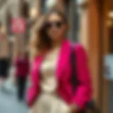 A chic fuchsia blazer styled with neutral tones for a sophisticated look