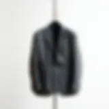 A sophisticated gray sport jacket on a stylish hanger against a minimalist background