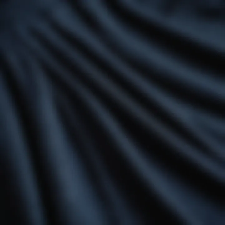 A close-up of the fabric texture of a dark blue linen skirt, showcasing its quality.