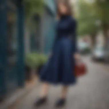 Dark blue linen skirt paired with seasonal footwear and a trendy handbag.