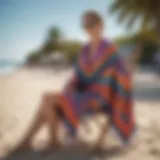 Colorful summer poncho draped elegantly on a beach chair